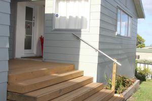deck with stainless steel handrail