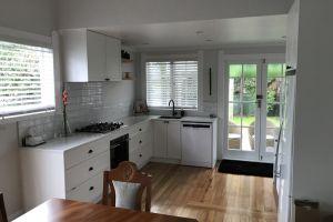 new kitchen and wooden floors