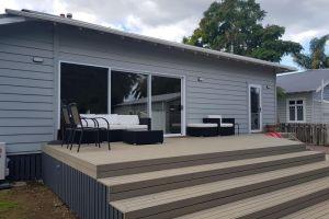 New deck, stairs, door joinery and painted exterior of house. whangarei