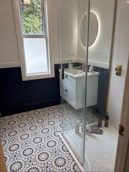 Bathroom renovation including new window in keeping with bungalow style of house.