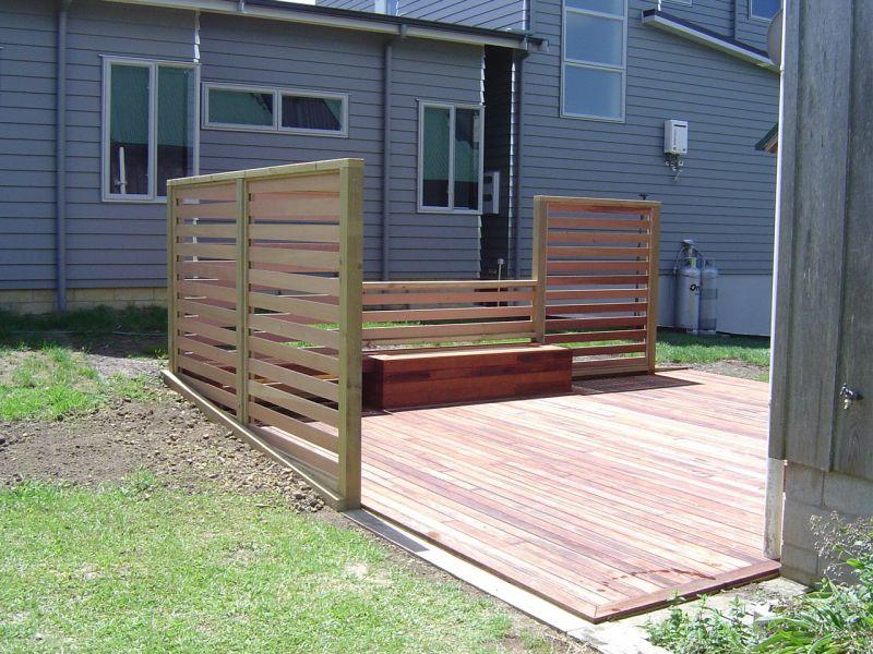 New Kwila timber deck with screening, planter box and seating.
